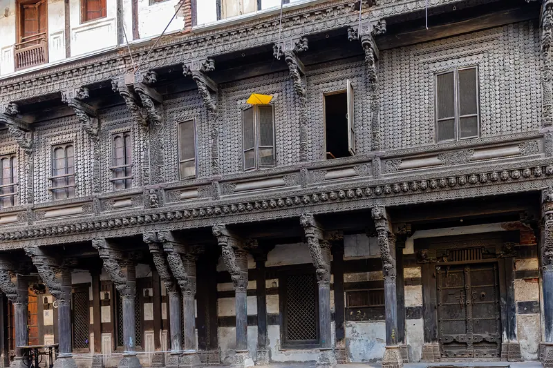 Carved wooden haveli facade in a pol of old Ahmedabad